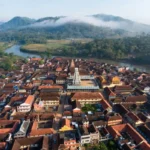 Aerial view of Dharmasthala temple town representing the latest Dharmasthala news