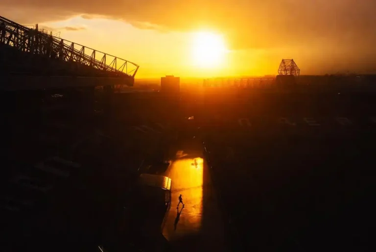 Manchester United transfer news 2025 hero image with Old Trafford stadium