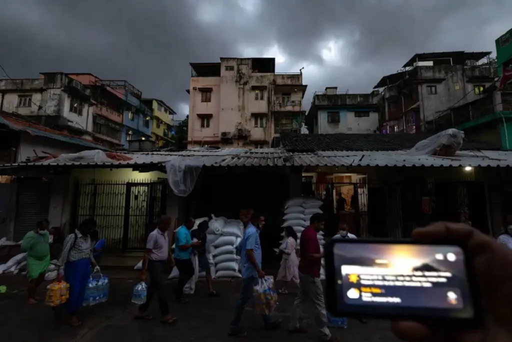 Mumbai residents preparing for monsoon rain with emergency kits and flood safety measures